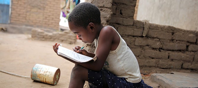A Malawi Child learning from Nu Skin's Educational initiatives